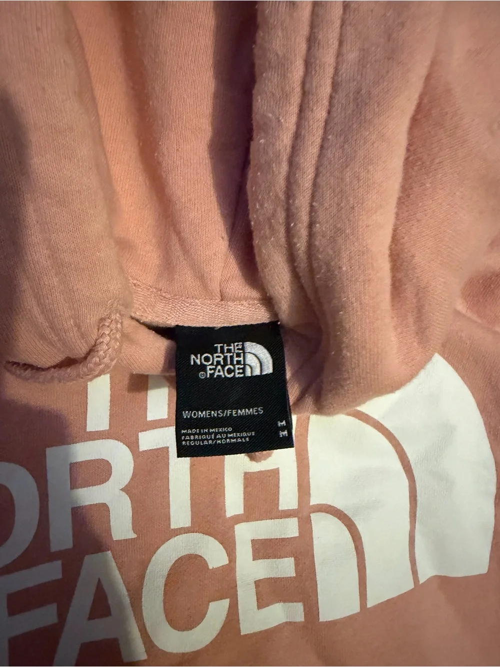 Women's hoodie with brand tag